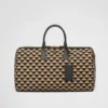 大きなPrada Symboleが刺繍されたファブリック製トラベルバッグ