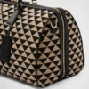 大きなPrada Symboleが刺繍されたファブリック製トラベルバッグ
